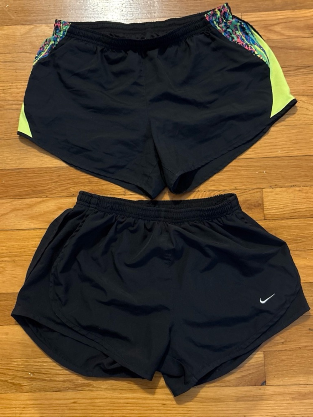 Nike Women’s Black Athletic Shorts with Neon Accent